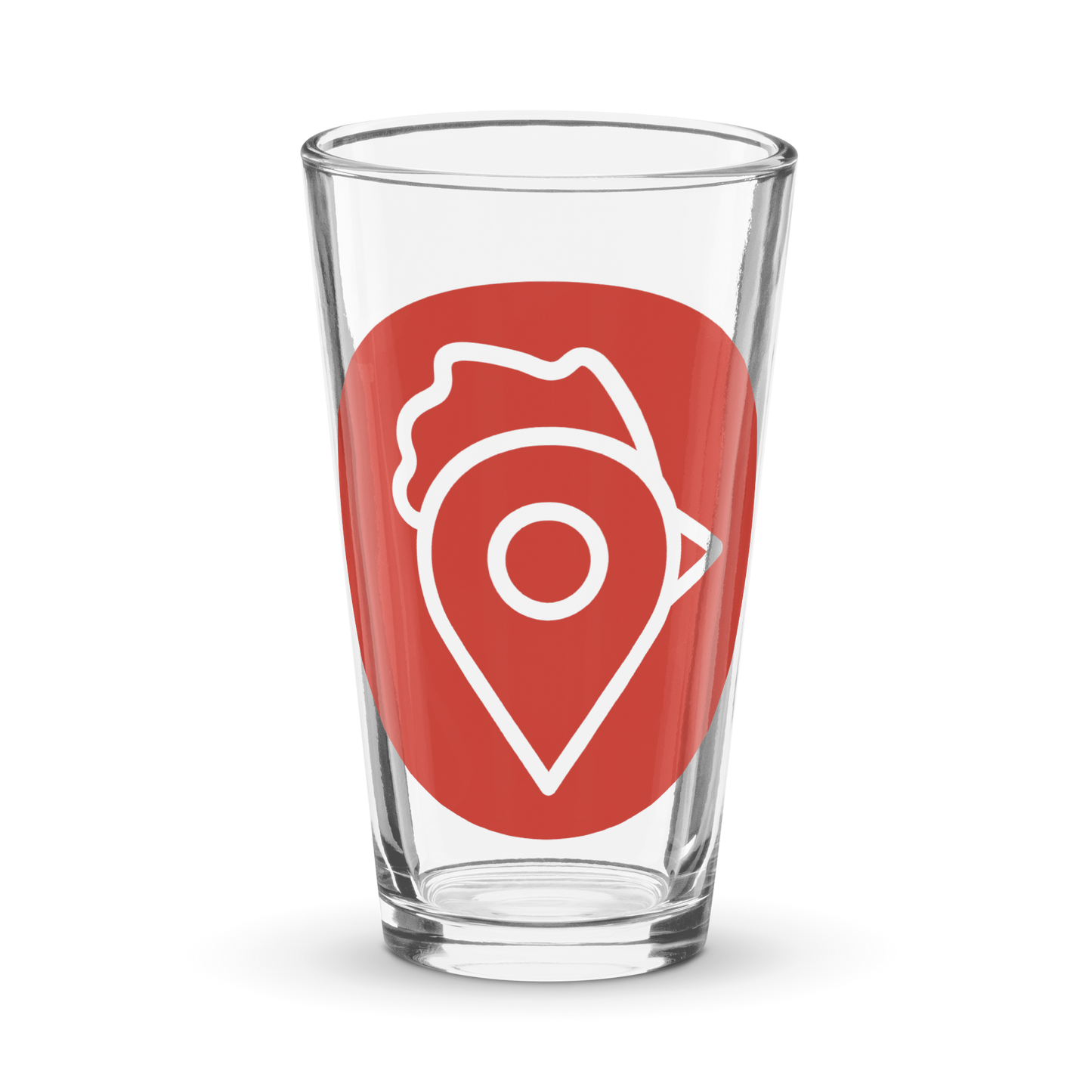 Close-up of The Nugget Spot Signature 16oz Pint Glass with bold red logo on a black background.