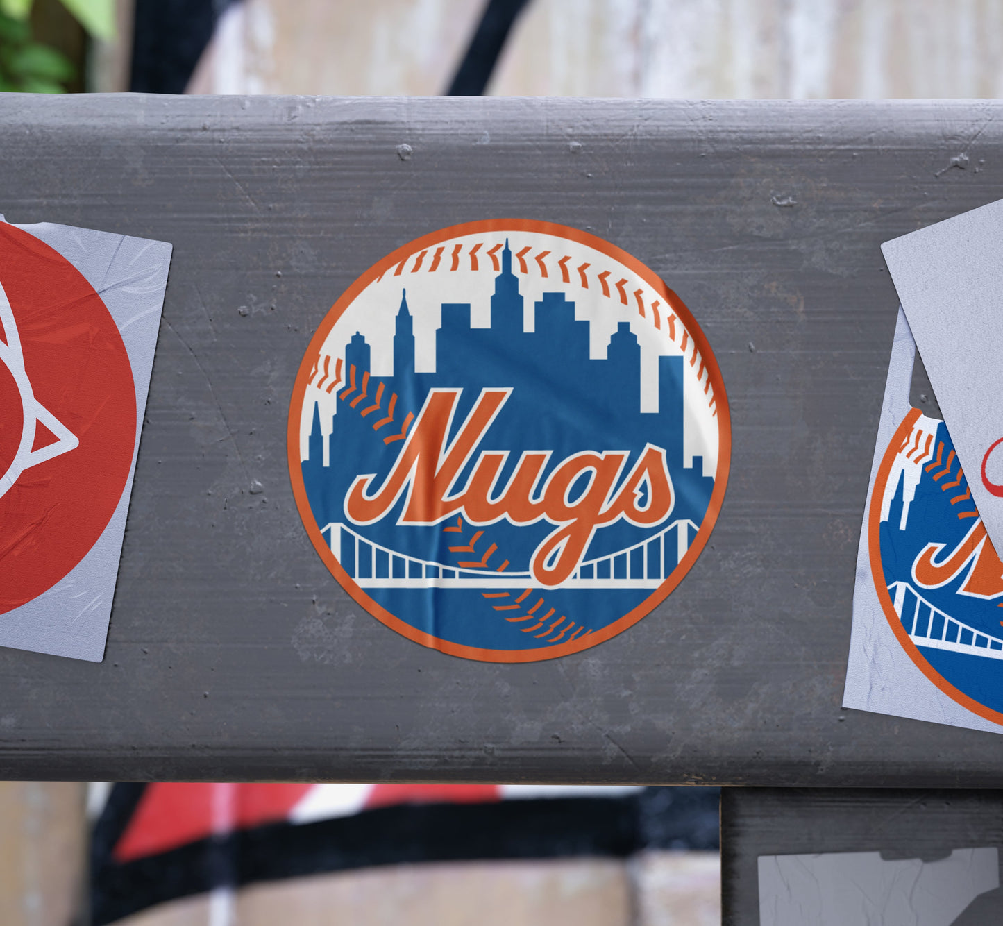 New York Nugs sticker displayed on a gray street railing with other stickers around it.
