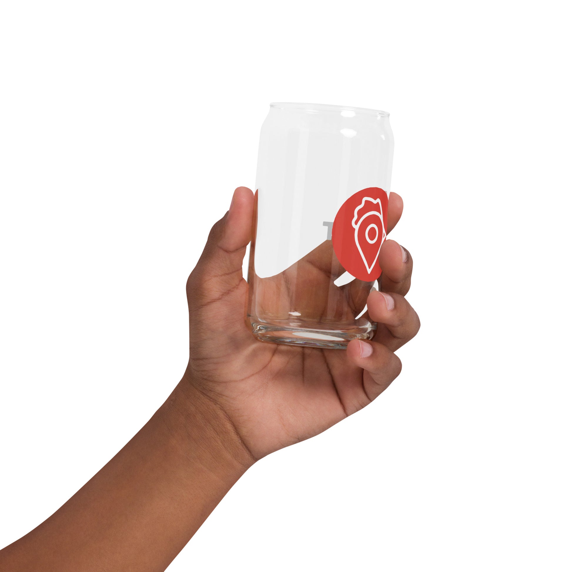 Hand holding The Nugget Spot 16oz clear can glass