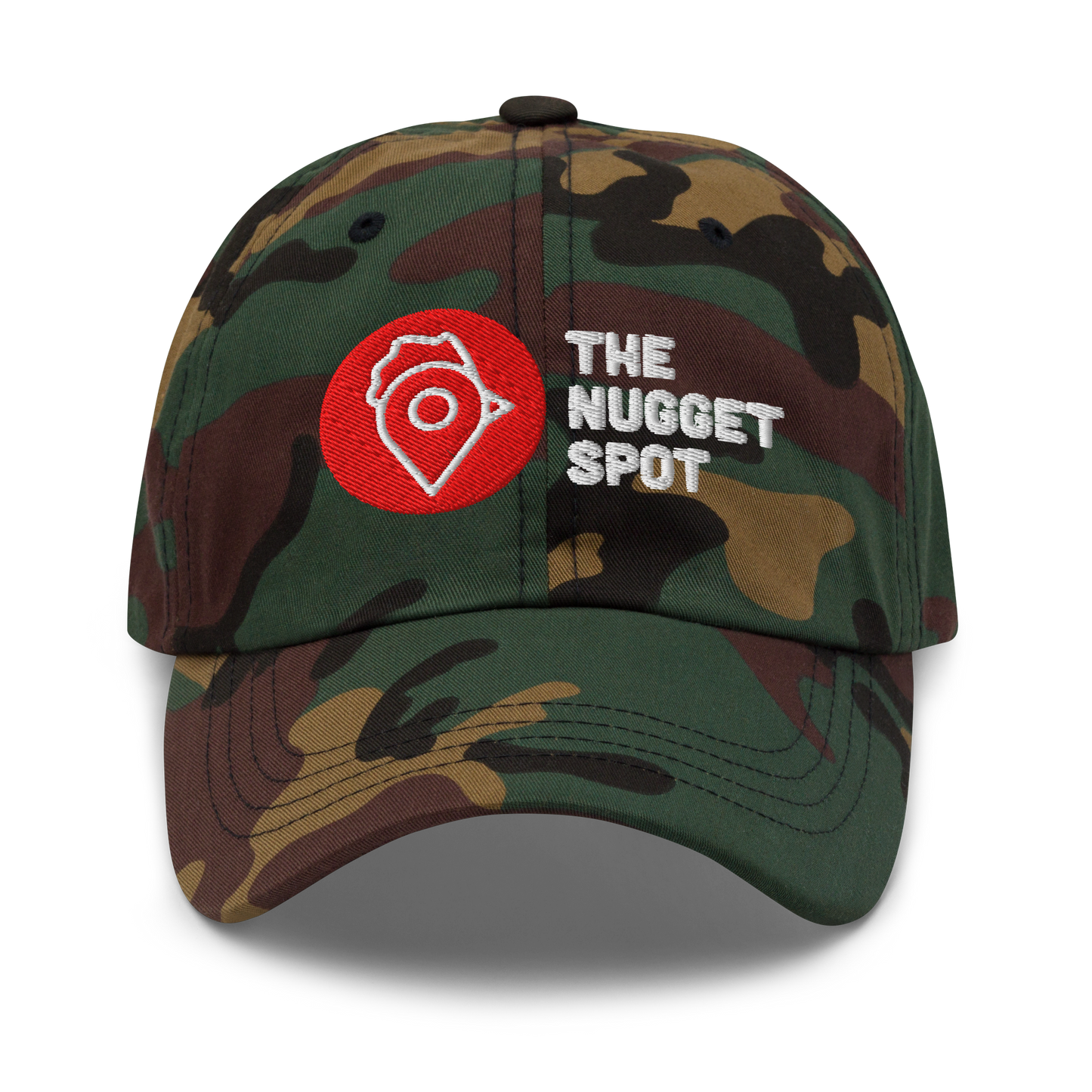 Front view of camo The Nugget Spot dad hat with red embroidered logo and white text.