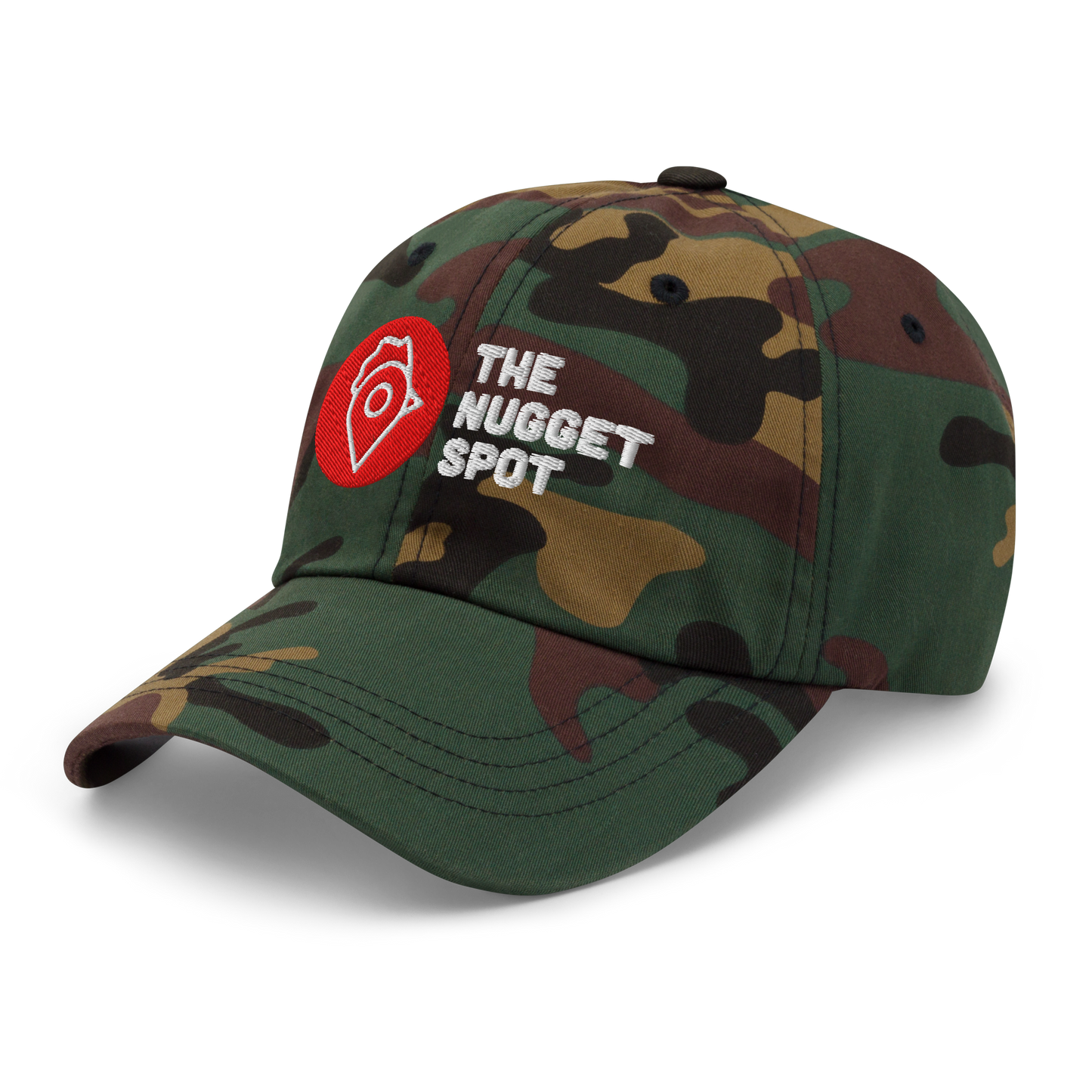 Angled product view of The Nugget Spot camo dad hat with embroidered logo.