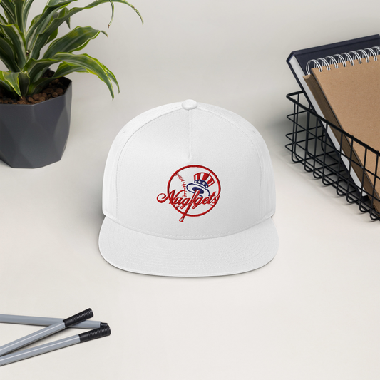 White New York Nugget snapback hat displayed on a desk with notebooks and pens.