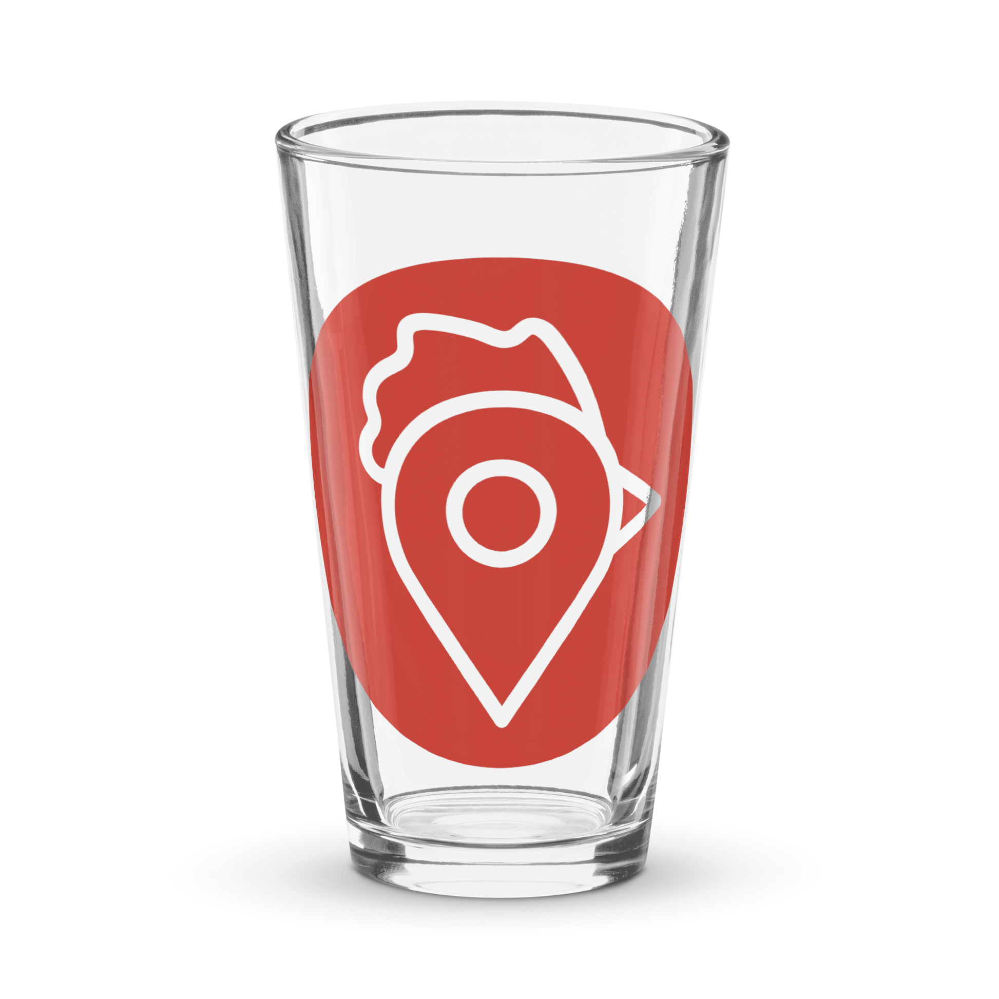 Close-up of The Nugget Spot Signature 16oz Pint Glass with bold red logo on a black background.